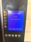 Lang oven display reading Sample Program, Heating, going to 275 degrees, with control buttons