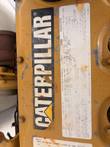 Caterpillar valve cover decal and engine information label, photographed rotated sideways