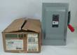Siemens HF222N safety switch beside its worn shipping carton, with ON/OFF door plate and red handle
