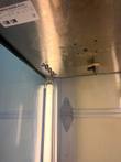 Inside top of Hatco cabinet: rating label with UL marks, vent slots, stainless ceiling and humidity fitting