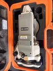 Nikon NE-20S theodolite in its open orange hard case, with the NE-20S label and a Toolwatch barcode