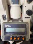Nikon NE-20S theodolite LCD panel with %, R/L, Hold and RST buttons, serial plate 806333