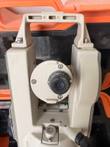 Nikon NE-20S theodolite telescope lens end and carry handle, seen in its orange case