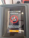 Nilfisk Liberty SC60 touchscreen showing an Escalator Warning message with a Confirm button