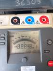 LCD analog scale and digits above the TEST button