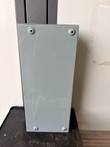 Flat gray steel enclosure panel with four mounting holes