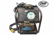 Hydratight RSL14 hydraulic torque pump with hand pendant and coiled power cord with yellow plug, white background