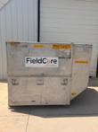 Aluminum FieldCore shipping-case enclosure labeled Induction System 10-Ton Chiller #1, 960 kgs, doors closed