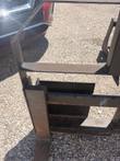 Pallet fork frame and left tine at the heel, with the quick-attach carriage plate behind
