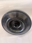 Rotor turned over showing the woven carbon fiber underside bowl and center hub