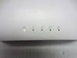 LED indicator row for power, LAN 1 and 2, and Wi-Fi 1 and 2 on the white access point housing