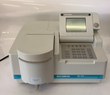Front of the Beckman DU 520 spectrophotometer with Single Cell Module, display, keypad and teal label