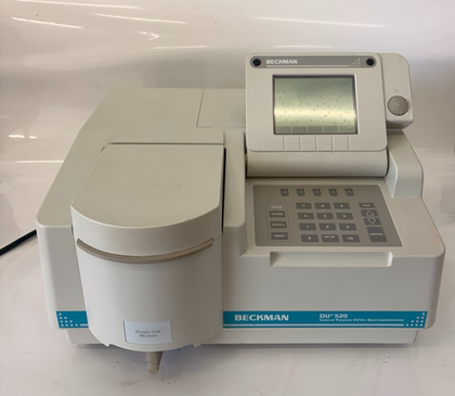 Front of the Beckman DU 520 spectrophotometer with Single Cell Module, display, keypad and teal label