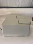 Cream benchtop Beckman spectrophotometer from the side with lids closed and power cord at left