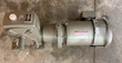 Mitsubishi Super Line brake motor bolted to a gray worm-gear reducer, shaft at left, red nameplate