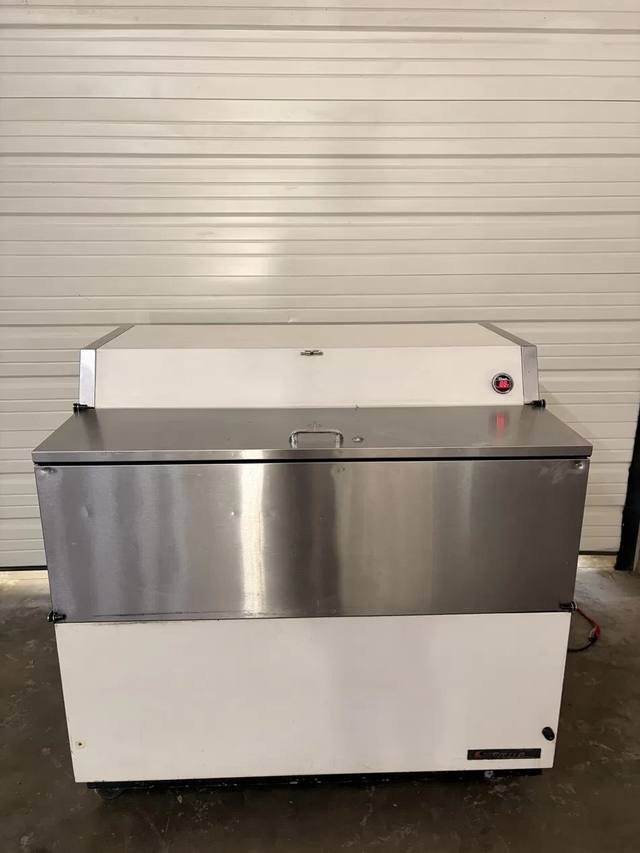 True TMC-49 mobile milk cooler, white with stainless front and top lid and a red digital temperature display