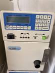 Jasco PU-2089 Plus quaternary gradient pump front with blue keypad and degasser switch, a unit below