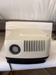 Rear of the cream BioTek microplate reader with a cooling fan grille and vent slots