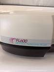 FL600 Microplate Fluorescence Reader front label on the cream cover above the black base
