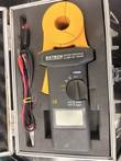 Extech 382356 ground resistance clamp-on tester with yellow jaw in its foam case, test leads at left