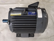 Gray Mitsubishi Super Line three-phase induction motor with lifting eye, finned housing and blue shaft
