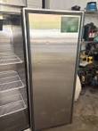 Stainless steel reach-in refrigerator door closed, left door open showing white wire shelves