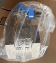 Threaded butterfly valve in a clear plastic bag, C&C and 200 WP cast on the body
