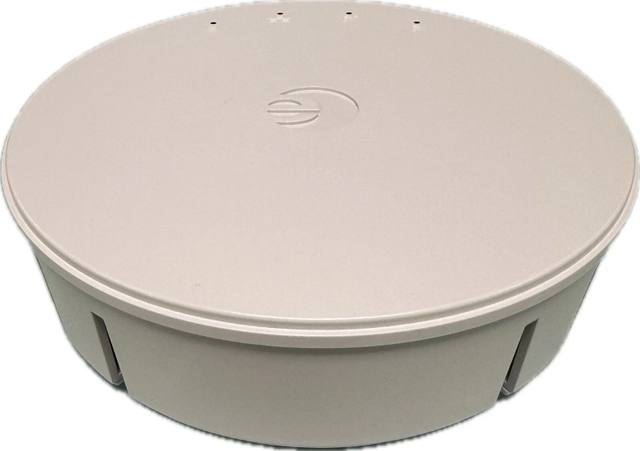 Round white Enterasys access point seen at an angle, showing the top and side