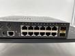 Front of the Enterasys switch: twelve RJ45 ports, two SFP slots, console port, power inputs and status LEDs