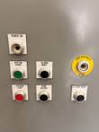Panel pushbuttons labeled Power On, System Start, System Stop, Alarm Reset, Horn Silence, E-Stop Reset, Emergency Stop