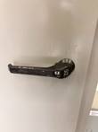 Black SCE enclosure door handle on the gray control panel door