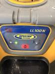 Spectra Precision LL100N laser level control panel with power button and indicator lights