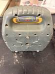 Underside of the gray Spectra Precision LL100N laser level, with mounting holes and carry handle