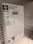 McCall freezer data label showing serial S-832112, 115V, 1 phase, 60 Hz, R404A refrigerant