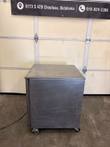 McCall F-6E stainless steel freezer, side view, on casters