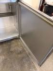 Open McCall freezer door showing the gasket and inner panel