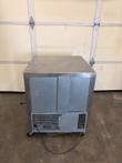 Rear of the McCall F-6E freezer showing compressor grille, power cord and casters