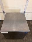 Top of the McCall F-6E stainless freezer with door and logo plate