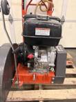 Floor saw Honda gas engine side: red on/off switch, fuel tank warning label and orange base frame