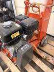 Rear corner of Husqvarna floor saw: Honda engine, Cyclone air cleaner, orange frame, rear wheel and ratchet strap