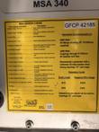 Yellow MSA error code label with generator recommendations, extension cord gauges, 90-140 VAC input rating and serial 42185