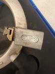 Rotary peeler cutter block stamped 6" IPS with brass blade holder, black handle below in case foam
