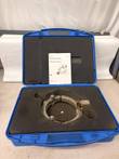 Open blue GF carrying case holding the silver Rotary Peeler RS ring in foam, instruction manual on the lid